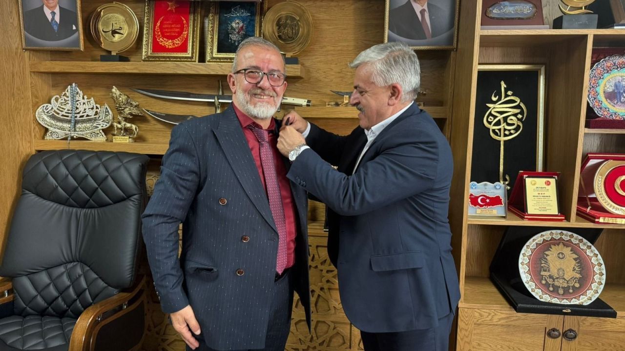 Orhan Bulut ve Ailesi MHP'ye geri döndü