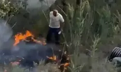 Çıkan Yangını Pet Şişeyle Söndürmeye Çalıştı!