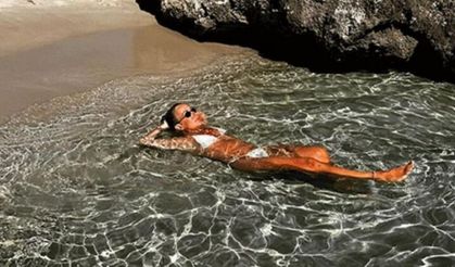 Saba Tümer gündem oldu, beyaz bikinisiyle sere serpe uzandı