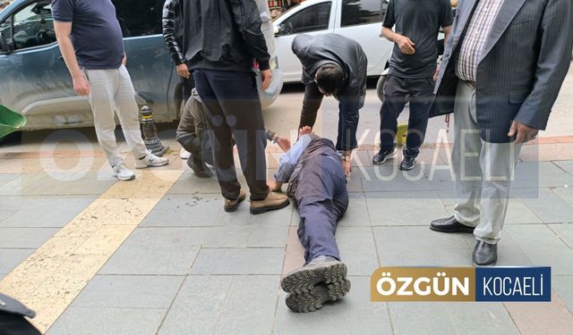 Yaşlı adam otomobilin üzerine düştü